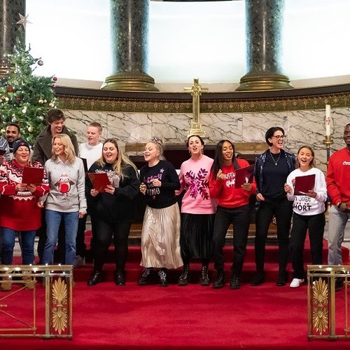 The cast of EastEnders perform at the Solving Kids' Cancer UK Christmas Carol Concert.
