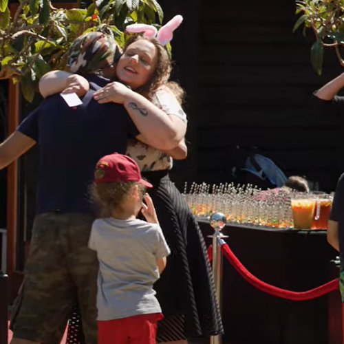 Family support worker Hayley hugging a parent at our family fun day event.