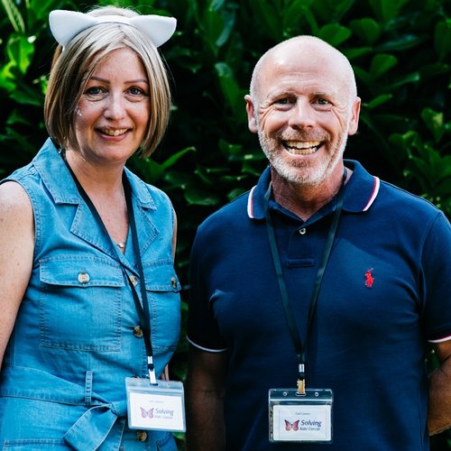 Solving Kids' Cancer UK CEO Gail Jackson alongside Patron, Carl Cavers, at the Family Fun Day in 2022.