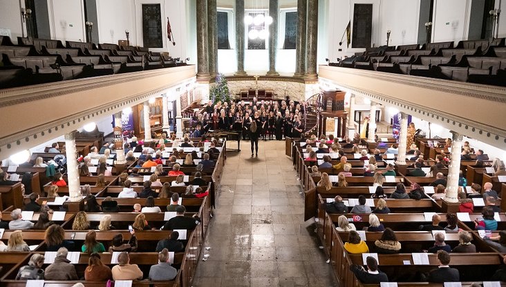 The London Show Choir performs at the Solving Kids' Cancer UK Christmas Carol Concert in 2022.