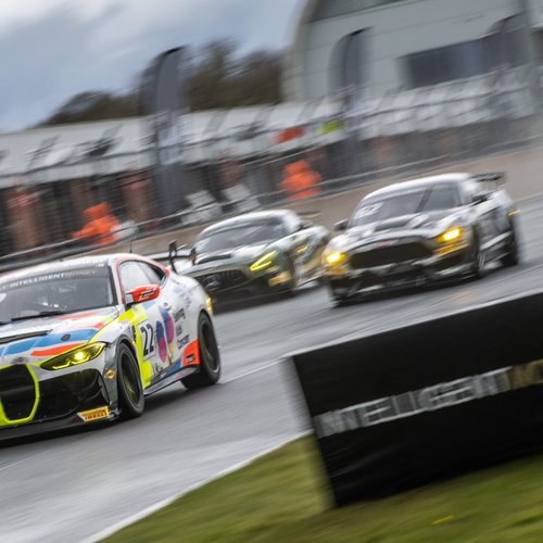 Cars racing at British Racing Greats, a fundraising and awareness event in aid of Solving Kids' Cancer UK and SpecialEffect.